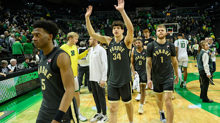 Purdue Boilermakers forward Raleigh Burgess (34) waves to the fans after a win against the Oregon Ducks 