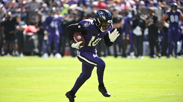 Oct 5, 2025; Baltimore, Maryland, USA; Baltimore Ravens wide receiver Deandre Hopkins (10) runs for a gain during the first quarter against the Houston Texans at M&T Bank Stadium. Mandatory Credit: Rafael Suanes-Imagn Images