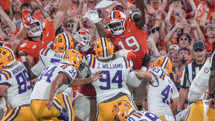 Clemson defensive lineman DeMonte Capehart (19) reaches attempting to block a field goal Louisiana State University kicker Damian Ramos (34) kicked wide during the third quarter at Memorial Stadium in Clemson, S.C. Saturday, August 30, 2025.