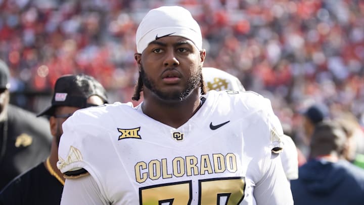 Oct 19, 2024; Tucson, Arizona, USA; Colorado Buffalos offensive tackle Jordan Seaton (77) against the Arizona Wildcats at Arizona Stadium. Mandatory Credit: Mark J. Rebilas-Imagn Images