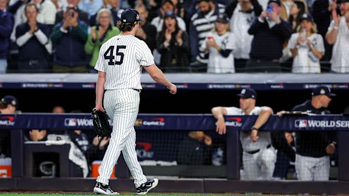 Oct 30, 2024; New York, New York, USA; New York Yankees pitcher Gerrit Cole (45) walks off the field after being relieved during the seventh inning against the Los Angeles Dodgers in game four of the 2024 MLB World Series at Yankee Stadium. Mandatory Credit: Brad Penner-Imagn Images Oct 30, 2024; New York, New York, USA; New York Yankees pitcher Gerrit Cole (45) walks off the field after being relieved during the seventh inning against the Los Angeles Dodgers in game four of the 2024 MLB World Series at Yankee Stadium. Mandatory Credit: Brad Penner-Imagn Images