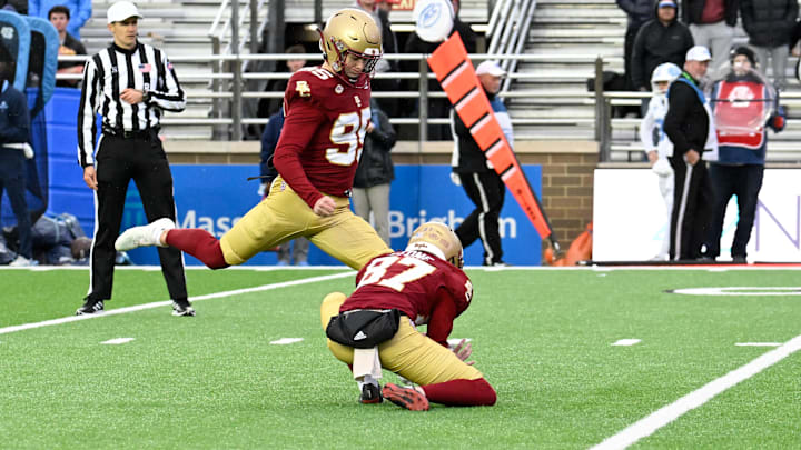 Nov 23, 2024; Chestnut Hill, Massachusetts, USA; Boston College Eagles place kicker Liam Connor (95) kicks an extra point against the North Carolina Tar Heels during the second half at Alumni Stadium. Mandatory Credit: Eric Canha-Imagn Images