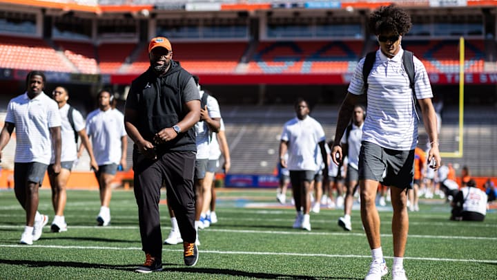 Florida Gators assistant coach for defensive line Gerald Chatman smiles with Florida Gators wide receiver Marcus Burke (88) during Gator Walk at the Orange and Blue spring football game at Steve Spurrier Field at Ben Hill Griffin Stadium in Gainesville, FL on Saturday, April 13, 2024. [Matt Pendleton/Gainesville Sun]