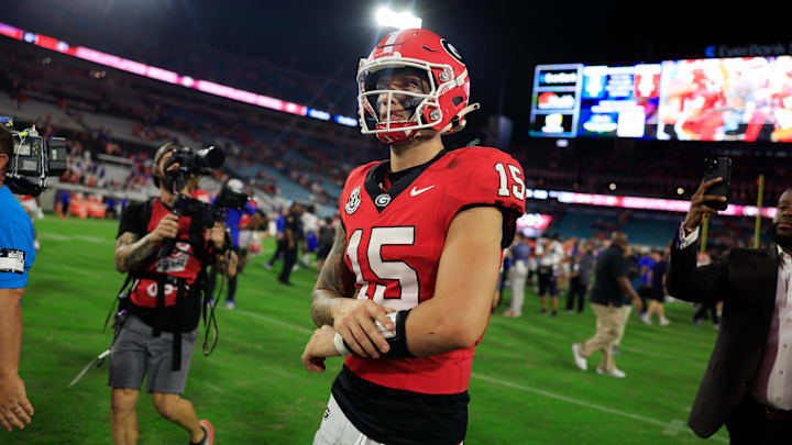 Georgia Bulldogs quarterback Carson Beck (15) walks off the field after the game of an NCAA college football matchup Saturday, Nov. 2, 2024 at EverBank Stadium in Jacksonville, Fla. The Georgia Bulldogs defeated the Florida Gators 34-20.
