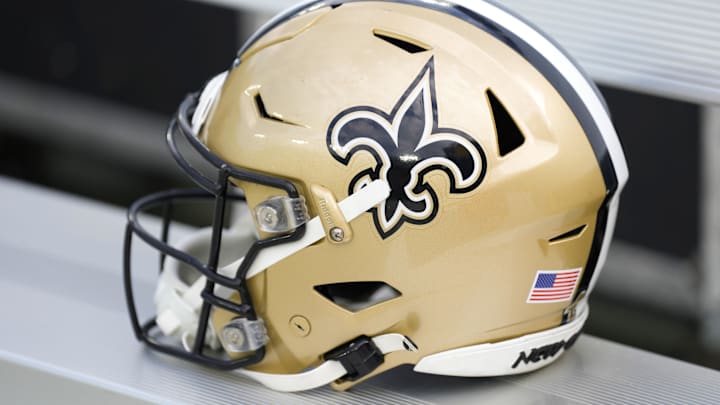 Sep 24, 2023; Green Bay, Wisconsin, USA; An New Orleans Saints helmet during warmups prior to the game against the Green Bay Packers at Lambeau Field. Mandatory Credit: Jeff Hanisch-Imagn Images Sep 24, 2023; Green Bay, Wisconsin, USA; An New Orleans Saints helmet during warmups prior to the game against the Green Bay Packers at Lambeau Field. Mandatory Credit: Jeff Hanisch-Imagn Images