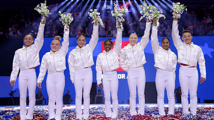 Joscelyn Roberson (second from left) and Leanne Wong (first on right) alongside the 2024 US Women's Artistic Gymnastics Olympic team at Olympic Trials