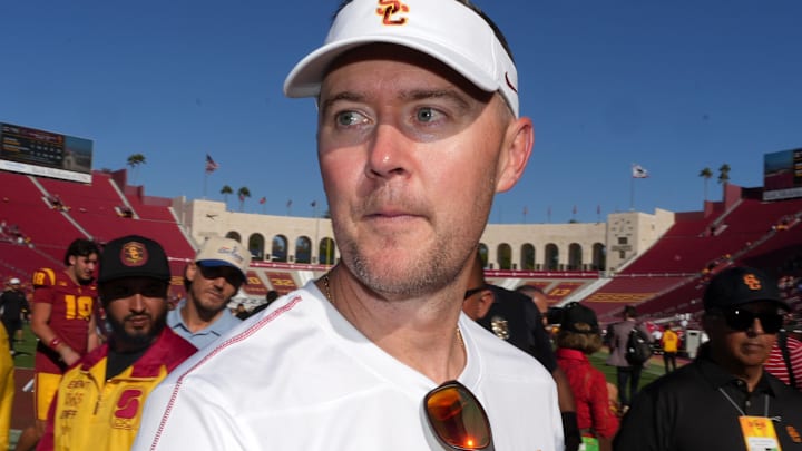 Sep 28, 2024; Los Angeles, California, USA; Southern California Trojans head coach Lincoln Riley reacts after a game against the Wisconsin Badgers at United Airlines Field at Los Angeles Memorial Coliseum. Mandatory Credit: Kirby Lee-Imagn Images Sep 28, 2024; Los Angeles, California, USA; Southern California Trojans head coach Lincoln Riley reacts after a game against the Wisconsin Badgers at United Airlines Field at Los Angeles Memorial Coliseum. Mandatory Credit: Kirby Lee-Imagn Images