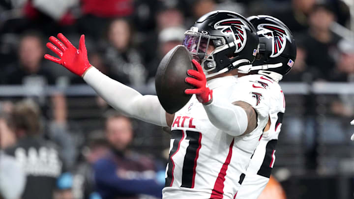 Dec 16, 2024; Paradise, Nevada, USA; Atlanta Falcons safety Justin Simmons (31) celebrates after intercepting a pass against the Las Vegas Raiders in the second half at Allegiant Stadium. Mandatory Credit: Kirby Lee-Imagn Images