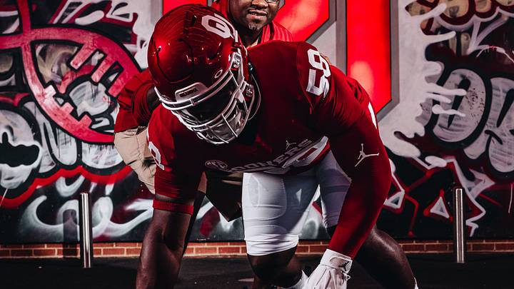 Oklahoma defensive lineman James Carrington, defensive tackles coach Todd Bates Oklahoma defensive lineman James Carrington, defensive tackles coach Todd Bates