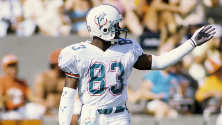 Wide receiver Mark Clayton on the field against the Tampa Bay Buccaneers at Tampa Stadium during the 1988 season. Wide receiver Mark Clayton on the field against the Tampa Bay Buccaneers at Tampa Stadium during the 1988 season.