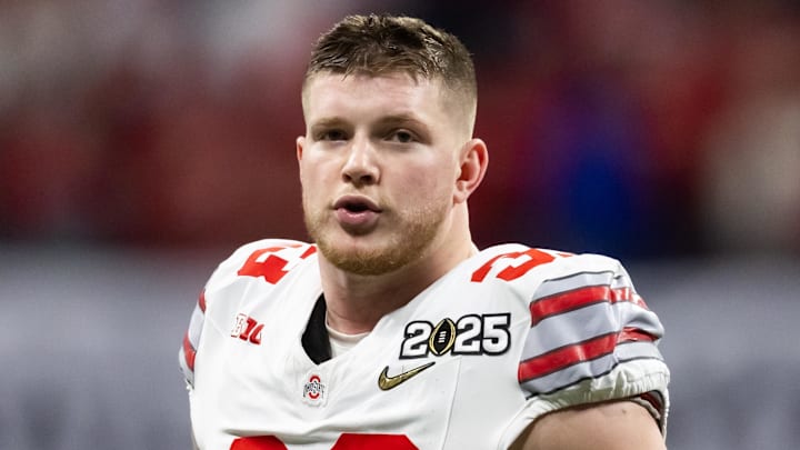 Jan 20, 2025; Atlanta, GA, USA; Ohio State Buckeyes defensive end Jack Sawyer (33) against the Notre Dame Fighting Irish during the CFP National Championship college football game at Mercedes-Benz Stadium. Mandatory Credit: Mark J. Rebilas-Imagn Images Jan 20, 2025; Atlanta, GA, USA; Ohio State Buckeyes defensive end Jack Sawyer (33) against the Notre Dame Fighting Irish during the CFP National Championship college football game at Mercedes-Benz Stadium. Mandatory Credit: Mark J. Rebilas-Imagn Images