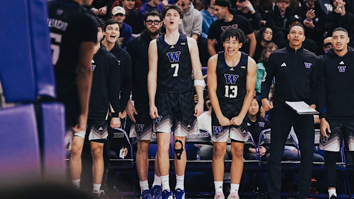 Christian King (7) and Jase Butler (13) show their appreciation from the UW bench. 