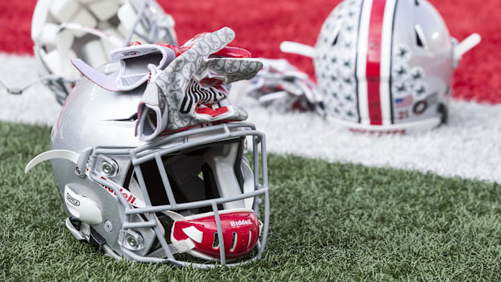 Oct 29, 2016; Columbus, OH, USA; A general view of player helmets on the field before the game between the Ohio State Buckeyes and Northwestern Wildcats at Ohio Stadium. Mandatory Credit: Greg Bartram-Imagn Images Oct 29, 2016; Columbus, OH, USA; A general view of player helmets on the field before the game between the Ohio State Buckeyes and Northwestern Wildcats at Ohio Stadium. Mandatory Credit: Greg Bartram-Imagn Images