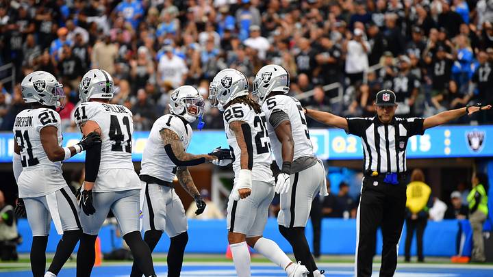Oct 1, 2023; Inglewood, California, USA; Las Vegas Raiders safety Tre'von Moehrig (25) is greeted by safety Marcus Epps (1) and linebacker Divine Deablo (5) after blocking a pass intended for Los Angeles Chargers tight end Donald Parham Jr. (89) during the first half at SoFi Stadium. Mandatory Credit: Gary A. Vasquez-USA TODAY Sports Oct 1, 2023; Inglewood, California, USA; Las Vegas Raiders safety Tre'von Moehrig (25) is greeted by safety Marcus Epps (1) and linebacker Divine Deablo (5) after blocking a pass intended for Los Angeles Chargers tight end Donald Parham Jr. (89) during the first half at SoFi Stadium. Mandatory Credit: Gary A. Vasquez-USA TODAY Sports