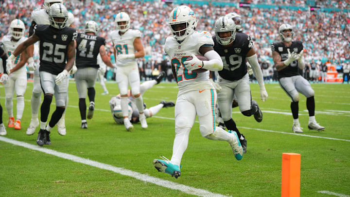 Miami Dolphins running back De'Von Achane (28) scores a touchdown in the fourth quarter against the Las Vegas Raiders at Hard Rock Stadium in 2024.
