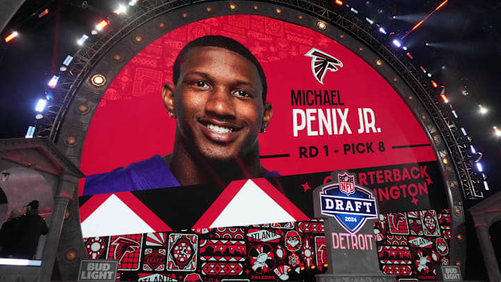 Apr 25, 2024; Detroit, MI, USA; Washington Huskies quarterback Michael Penix Jr. is selected as the No. 8 pick in the first round by Atlanta Falcons during the 2024 NFL Draft at Campus Martius Park and Hart Plaza. Mandatory Credit: Kirby Lee-Imagn Images