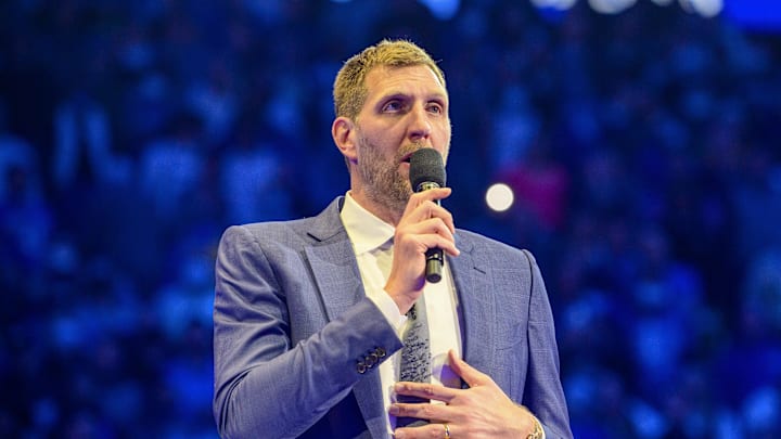 Jan 5, 2022; Dallas, Texas, USA; Former Dallas Mavericks player Dirk Nowitzki speaks to the fans as Nowitzki has his number 41 jersey retired after the game between the Dallas Mavericks and the Golden State Warriors at the American Airlines Center. Mandatory Credit: Jerome Miron-Imagn Images