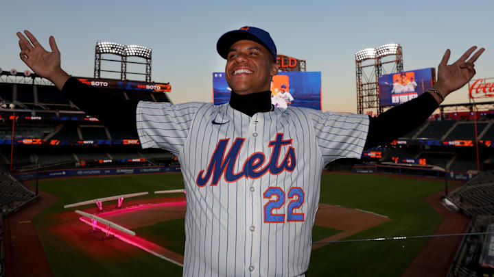 Dec 12, 2024; Flushing, NY, USA; New York Mets right fielder Juan Soto poses for photos during his introductory press conference at Citi Field. Mandatory Credit: Brad Penner-Imagn Images