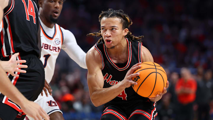 Nov 16, 2025; Birmingham, Alabama, USA; Houston Cougars guard Kingston Flemings (4) drives to the basket during the first half against the Houston Cougars at Legacy Arena at BJCC. 
