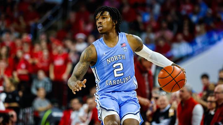 Feb 19, 2023; Raleigh, North Carolina, USA;  North Carolina Tar Heels guard Caleb Love (2) dribbles during the second half of the game against North Carolina State Wolfpack at PNC Arena. Mandatory Credit: Jaylynn Nash-USA TODAY Sports