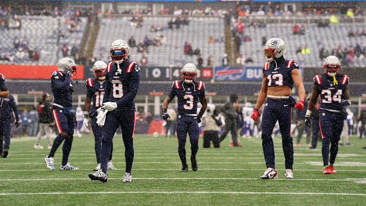 Dec 14, 2025; Foxborough, Massachusetts, USA; New England Patriots wide receiver Stefon Diggs (8) and teammates warm up before the start of the game against the Buffalo Bills at Gillette Stadium. Mandatory Credit: David Butler II-Imagn Images Dec 14, 2025; Foxborough, Massachusetts, USA; New England Patriots wide receiver Stefon Diggs (8) and teammates warm up before the start of the game against the Buffalo Bills at Gillette Stadium. Mandatory Credit: David Butler II-Imagn Images