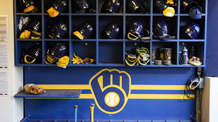 Sep 17, 2024; Milwaukee, Wisconsin, USA; General view of batting helmets inside the Milwaukee Brewers dugout prior to the game against the Philadelphia Phillies at American Family Field. Mandatory Credit: Jeff Hanisch-Imagn Images Sep 17, 2024; Milwaukee, Wisconsin, USA; General view of batting helmets inside the Milwaukee Brewers dugout prior to the game against the Philadelphia Phillies at American Family Field. Mandatory Credit: Jeff Hanisch-Imagn Images