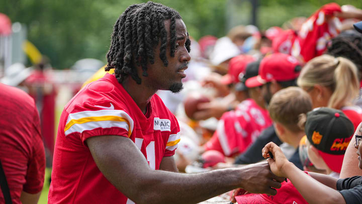 Jul 22, 2025; St. Joseph, MO, USA; Kansas City Chiefs wide receiver Jalen Royals (11) signs autographs for fans after training camp at Missouri Western State University. Mandatory Credit: Denny Medley-Imagn Images