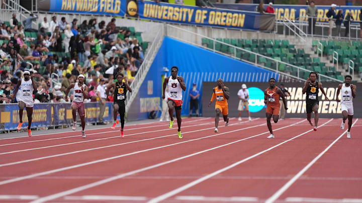 Jun 13, 2025; Eugene, OR, USA; Carli Makarawu of Kentucky (9), left, wins the 200m in 19.84 during the NCAA Track and Field Championships at Hayward Field. From top:Abdul-Rasheed Saminu of South Florida (1), Cameron Miller of Purdue (2), Max Thomas of Southern California (3), Xavier Butler of Texas (4), T'Mars McCallum of Tennessee (5), Makanakaishe Charamba of Auburn (6), Garrett Kaalund of Southern California (7), Jordan Anthony of Arkansas (8) and Makarawu.  Mandatory Credit: Kirby Lee-Imagn