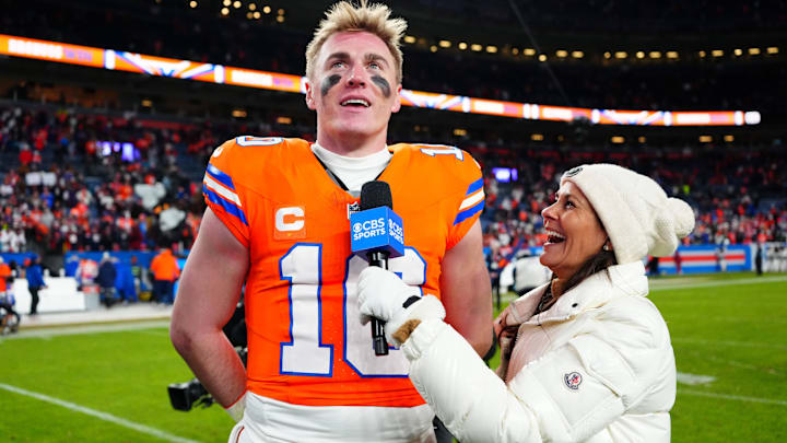 Tracy Wolfson interviews Denver Broncos quarterback Bo Nix (10) following the win against the Kansas City Chiefs at Empower Field at Mile High. 