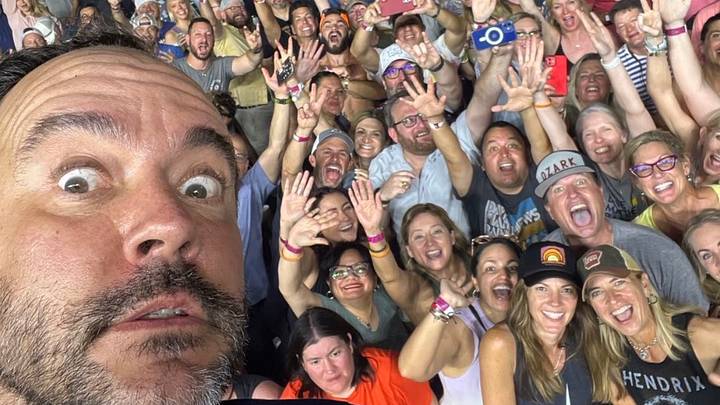 Dave Mathews taking a selfie on my phone while performing at the Gorge Amphitheatre, demonstrating their unique fan integration to the show - just like what banana ball does Dave Mathews taking a selfie on my phone while performing at the Gorge Amphitheatre, demonstrating their unique fan integration to the show - just like what banana ball does