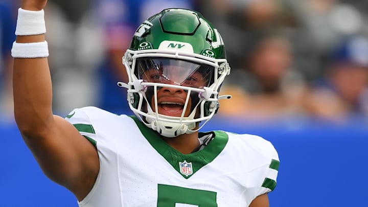 Aug 16, 2025; East Rutherford, New Jersey, USA; New York Jets quarterback Justin Fields (7) gestures while warming up prior to the game against the New York Giants at MetLife Stadium. Mandatory Credit: Rich Barnes-Imagn Images