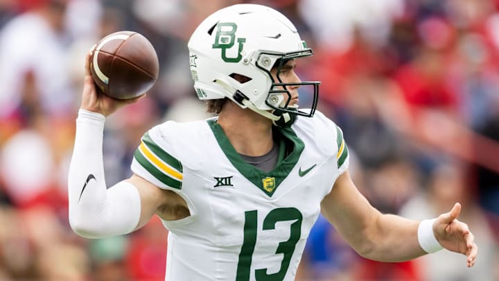 Nov 22, 2025; Tucson, Arizona, USA; Baylor Bears quarterback Sawyer Robertson (13) against the Arizona Wildcats at Casino Del Sol Stadium. Mandatory Credit: Mark J. Rebilas-Imagn Images