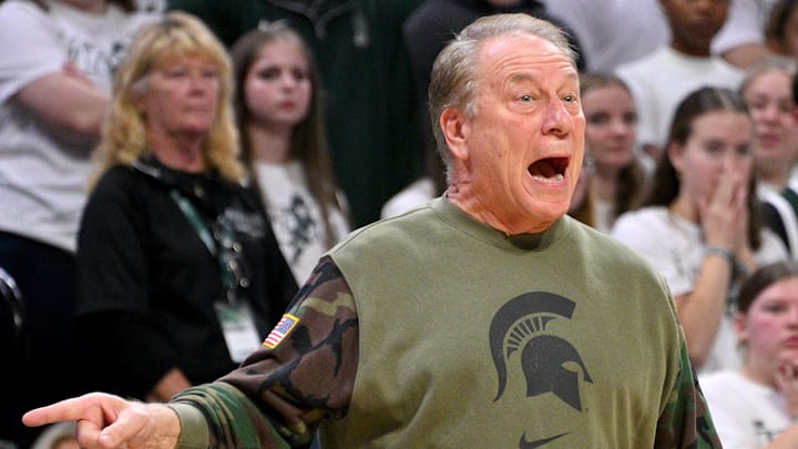 Nov 7, 2024; East Lansing, Michigan, USA;  Michigan State Spartans head coach Tom Izzo sends in a play during the first half against Niagara Purple Eagles at Jack Breslin Student Events Center. Mandatory Credit: Dale Young-Imagn Images