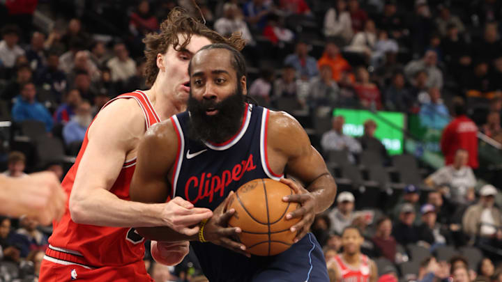Jan 20, 2025; Inglewood, California, USA; LA Clippers guard James Harden (1) drives against Chicago Bulls guard Josh Giddey (3) during the third quarter at Intuit Dome. Mandatory Credit: Jason Parkhurst-Imagn Images