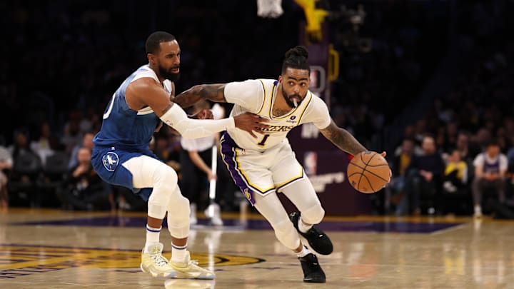 Mar 10, 2024; Los Angeles, California, USA; Los Angeles Lakers guard D'Angelo Russell (1) dribbles the ball against Minnesota Timberwolves guard Mike Conley (10) during the second quarter at Crypto.com Arena. Mandatory Credit: Kiyoshi Mio-Imagn Images Mar 10, 2024; Los Angeles, California, USA; Los Angeles Lakers guard D'Angelo Russell (1) dribbles the ball against Minnesota Timberwolves guard Mike Conley (10) during the second quarter at Crypto.com Arena. Mandatory Credit: Kiyoshi Mio-Imagn Images