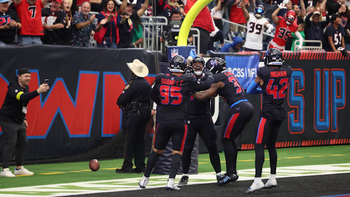 Jan 4, 2026; Houston, Texas, USA;  Houston Texans defensive tackle Tommy Togiai (72) celebrates with teammates after recovering a fumble for a touchdown against the Indianapolis Colts during the second half at NRG Stadium. Mandatory Credit: Thomas Shea-Imagn Images