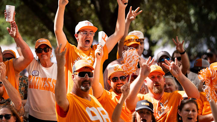 Fans cheer as the Vols arrive before a college football game between Tennessee and Mississippi State at Davis Wade Stadium in Starkville, Miss., on Sept. 27, 2025.