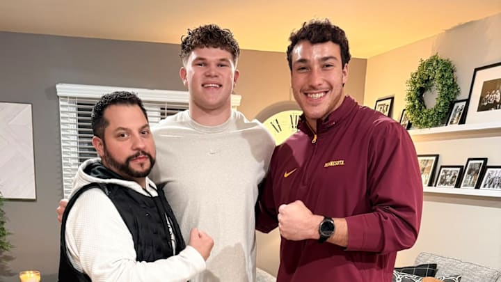 Kason Clayborne with Gophers DC Danny Collins (left) and linebackers coach Mariano Sori-Marin (right) on an in-home visit.