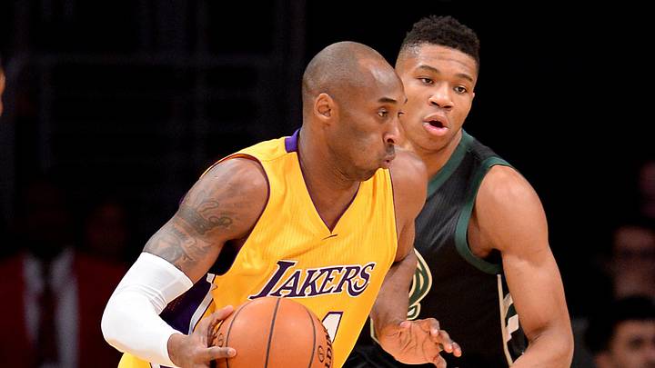 Dec 15, 2015; Los Angeles, CA, USA; Milwaukee Bucks forward Giannis Antetokounmpo (34) defends Los Angeles Lakers forward Kobe Bryant (24) as he drives to the basket in the first quarter of the game at Staples Center. Mandatory Credit: Jayne Kamin-Oncea-Imagn Images