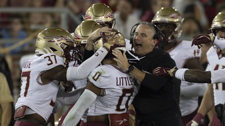 Oct 18, 2025; Stanford, California, USA;  Florida State Seminoles head coach Mike Norvell celebrates with defensive back Earl Little Jr. (0) during the first quarter against the Stanford Cardinal at Stanford Stadium. Mandatory Credit: Stan Szeto-Imagn Images