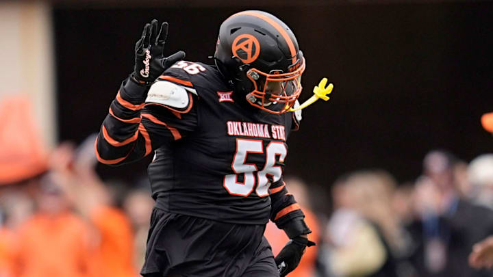 Oklahoma State Cowboys defensive end Xavier Ross (56) celebrates a missed Arizona State field goal in the first half the college football game between the Oklahoma State Cowboys and the Arizona State Sun Devils at Boone Pickens Stadium in Stillwater, Okla., Saturday, Nov., 2, 2024.