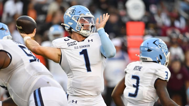 Sep 13, 2025; Blacksburg, Virginia, USA;  Old Dominion Monarchs quarterback Colton Joseph (1) throws a pass during the first quarter at Lane Stadium. 