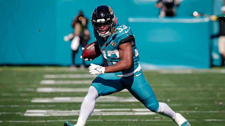Dec 14, 2025; Jacksonville, Florida, USA;Jacksonville Jaguars running back Bhayshul Tuten (33) runs the ball against the New York Jets at EverBank Stadium. Mandatory Credit: Travis Register-Imagn Images Dec 14, 2025; Jacksonville, Florida, USA;Jacksonville Jaguars running back Bhayshul Tuten (33) runs the ball against the New York Jets at EverBank Stadium. Mandatory Credit: Travis Register-Imagn Images