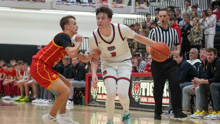 ADM-Adel senior Trey Bryte moves the ball up court against Carlisle during a high school basketball game on Jan. 13, 2026, at Adel-ADM High School in Adel. Mandatory Credit: Bryon Houlgrave-The Des Moines Register