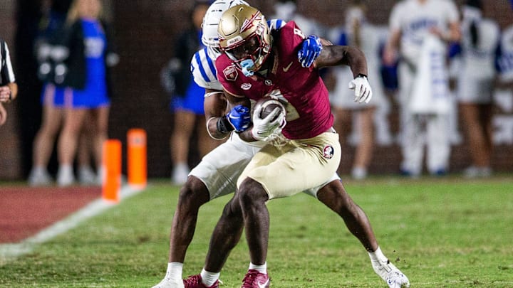 Florida State Seminoles wide receiver Hykeem Williams (8) tries to fight off a tackle. The Florida State Seminoles defeated the Duke Blue Devils 38-20 on Saturday, Oct. 21, 2023.