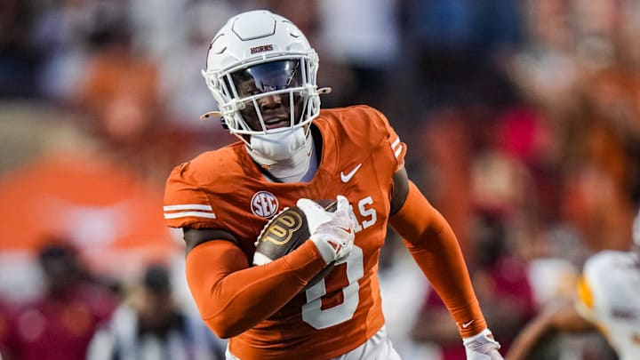 Texas Longhorns linebacker Anthony Hill Jr. (0) runs the ball for a touchdown off an interception, which was disallowed due to an illegal block in the first half of the Texas Longhorns' game against the ULM Warhawks at Darrell K Royal Texas Memorial Stadium in Austin, Sept. 21, 2024. Texas Longhorns linebacker Anthony Hill Jr. (0) runs the ball for a touchdown off an interception, which was disallowed due to an illegal block in the first half of the Texas Longhorns' game against the ULM Warhawks at Darrell K Royal Texas Memorial Stadium in Austin, Sept. 21, 2024.