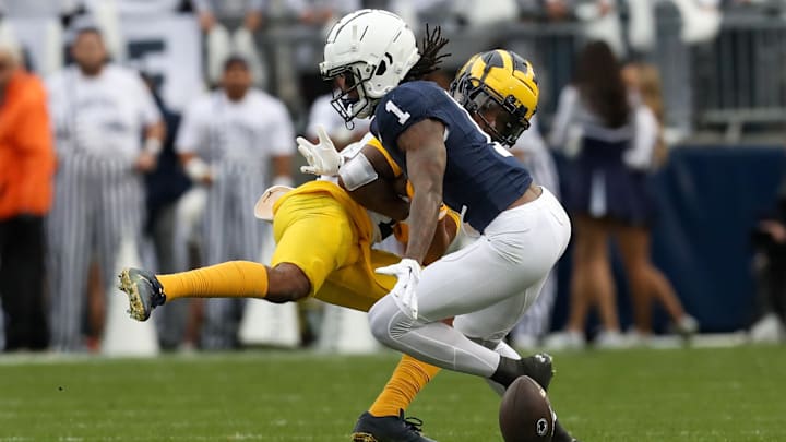 Nov 11, 2023; University Park, Pennsylvania, USA; Penn State Nittany Lions wide receiver KeAndre Lambert-Smith (1) drops a pass against the Michigan Wolverines during the third quarter at Beaver Stadium. Michigan won 24-15. Mandatory Credit: Matthew O'Haren-Imagn Images