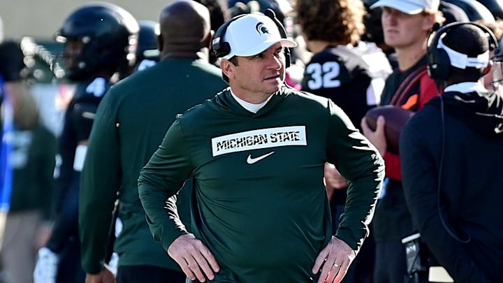 Nov 2, 2024; East Lansing, Michigan, USA;  Michigan State Spartans head coach Jonathan Smith looks over his sidelines during the first quarter against the Indiana Hoosiers at Spartan Stadium. Mandatory Credit: Dale Young-Imagn Images