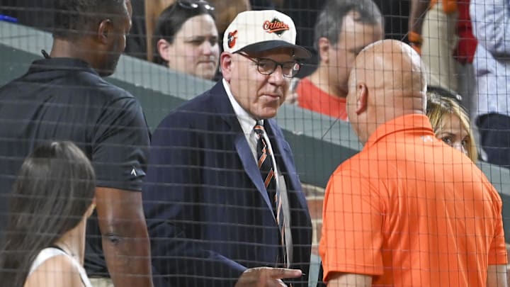 Jul 30, 2024; Baltimore, Maryland, USA; Baltimore Orioles majority owner David Rubenstein speaks with Cal Ripken behind home plate during the game against the Toronto Blue Jays at Oriole Park at Camden Yards. Jul 30, 2024; Baltimore, Maryland, USA; Baltimore Orioles majority owner David Rubenstein speaks with Cal Ripken behind home plate during the game against the Toronto Blue Jays at Oriole Park at Camden Yards.