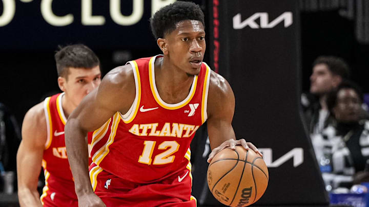 Nov 22, 2023; Atlanta, Georgia, USA; Atlanta Hawks forward De'Andre Hunter (12) handles the ball against the Brooklyn Nets during the first half at State Farm Arena. Mandatory Credit: Dale Zanine-Imagn Images Nov 22, 2023; Atlanta, Georgia, USA; Atlanta Hawks forward De'Andre Hunter (12) handles the ball against the Brooklyn Nets during the first half at State Farm Arena. Mandatory Credit: Dale Zanine-Imagn Images